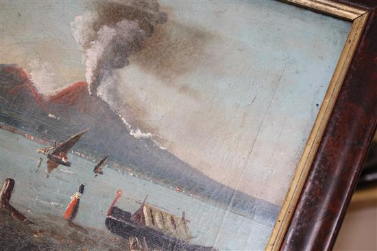 19th century Italian School, oil on canvas, View of the Bay of Naples with Vesuvius erupting, 29 x 50cm